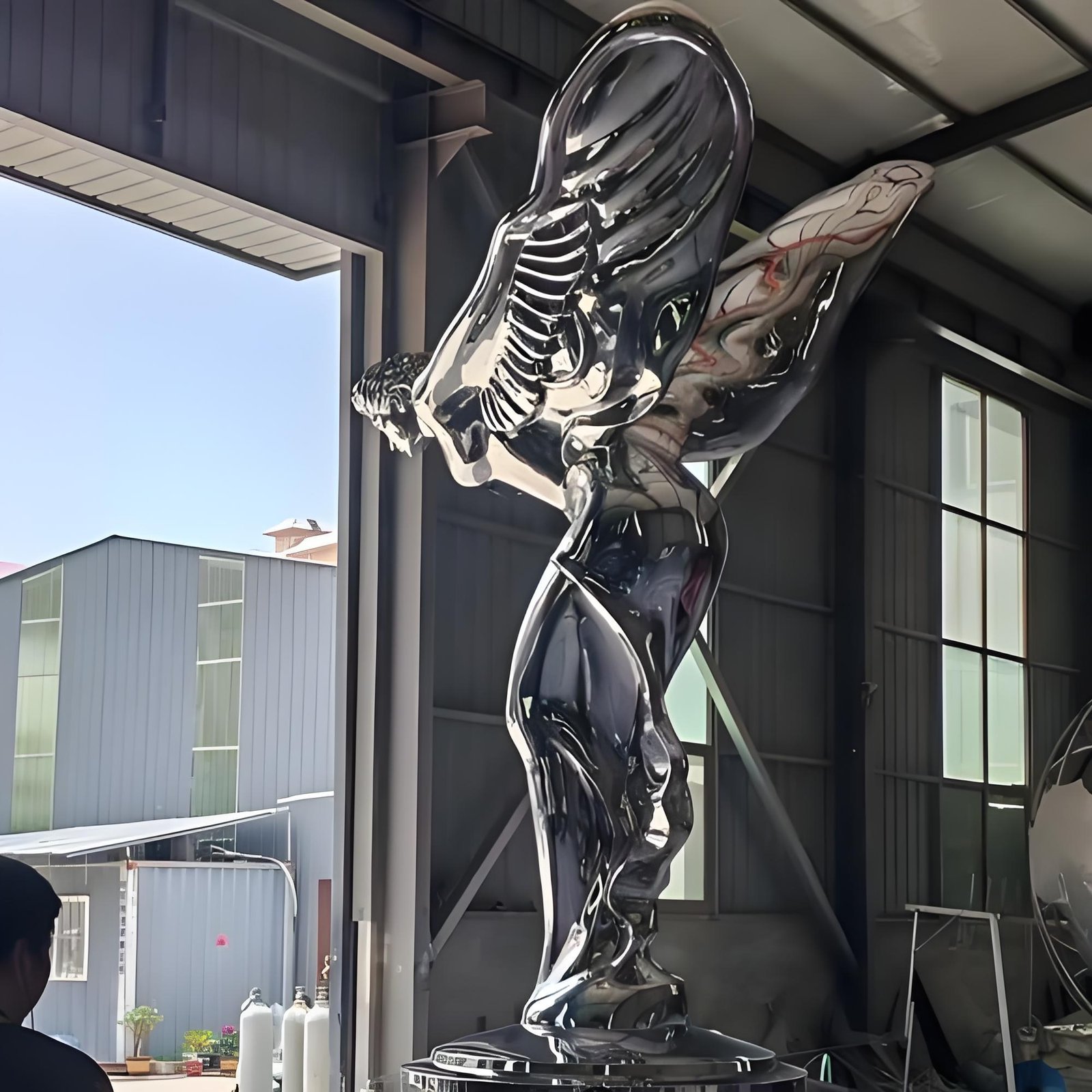 Winged spirit figure